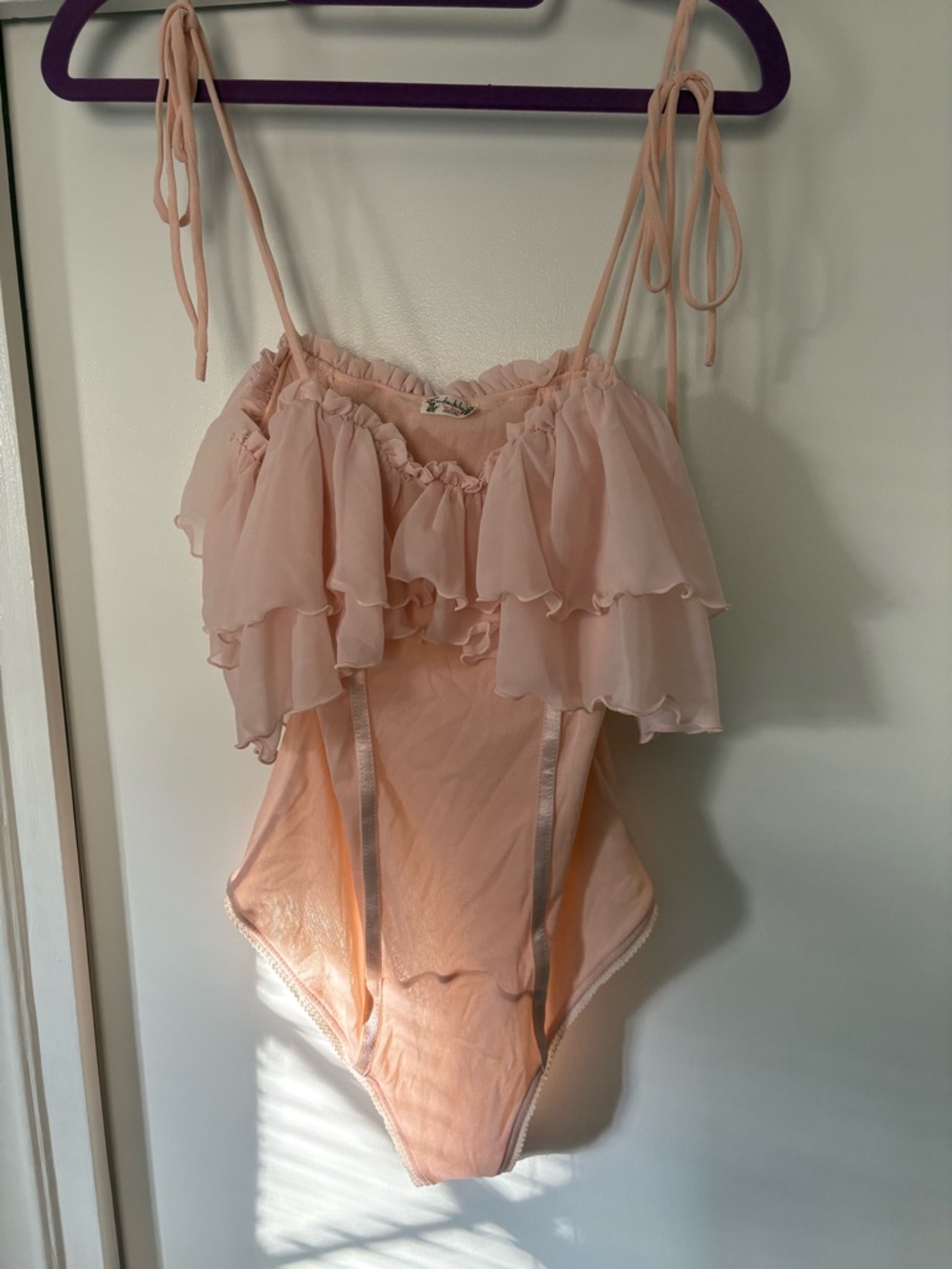 Free People Blush Pink Ruffle One-Piece Bodysuit